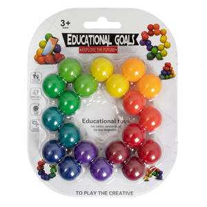 Packaged educational toy with colorful balls on a white background