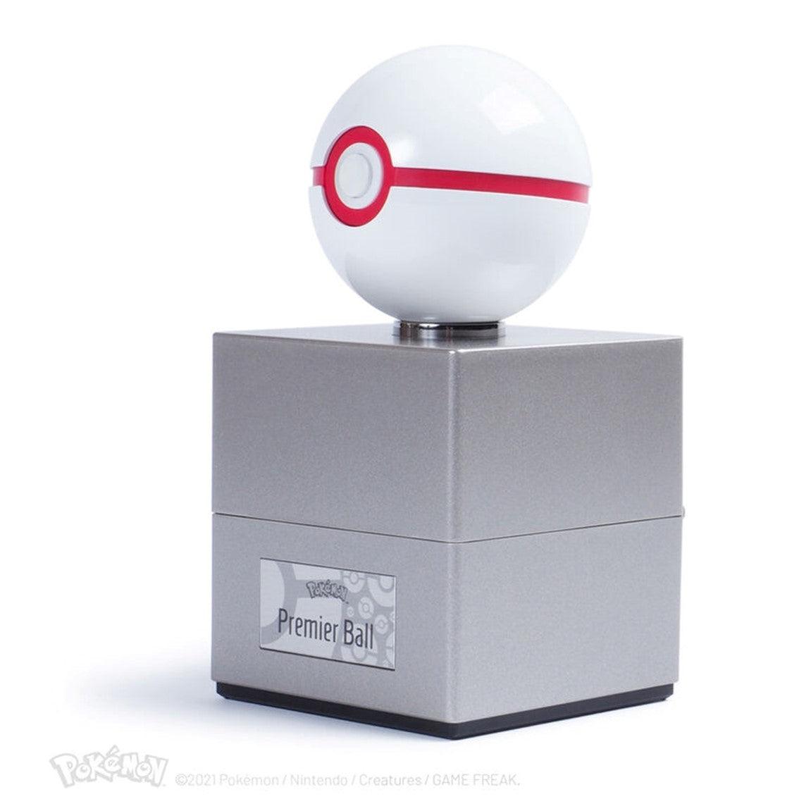 The Wand Company Premier Ball Authentic Replica - Realistic, Electronic, Die-Cast Poke Ball with Ball and Display Case Light Features Officially Licensed by Pokemon